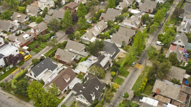 Mandating inefficiency: Minimum lot size regulation and housing